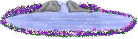 fountain with purple flower border